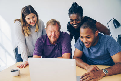 Family using a computer together