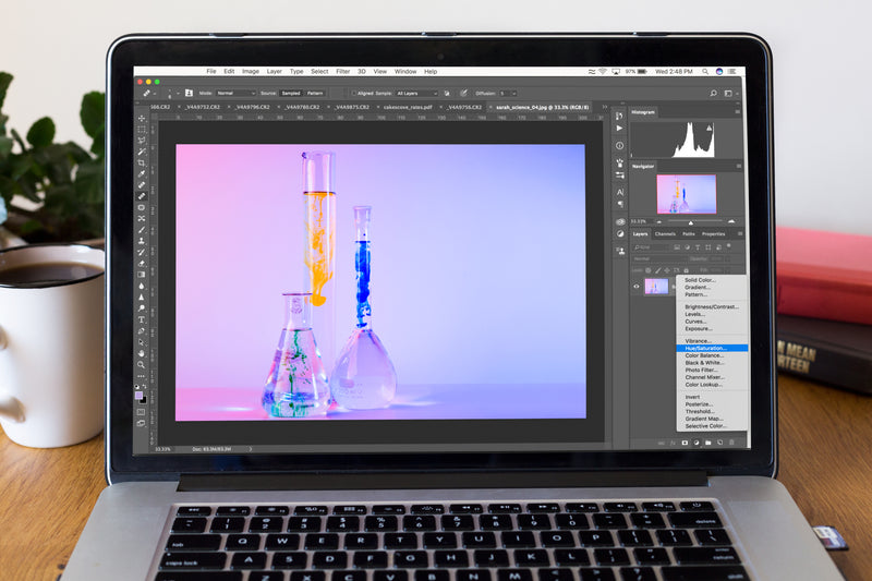 Editing photos on a laptop