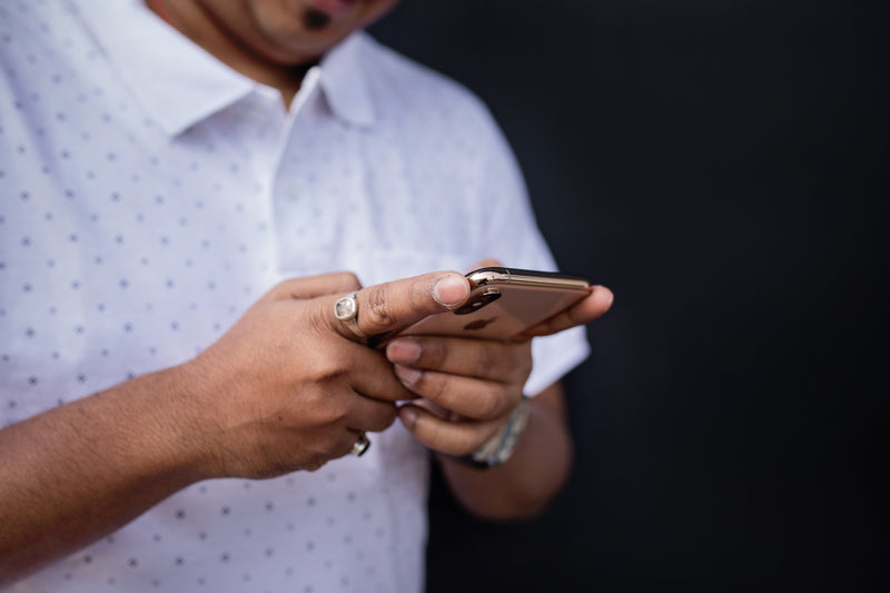Hands holding a smartphone