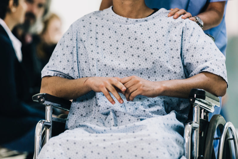 Patient in a wheelchair at a healthcare facility