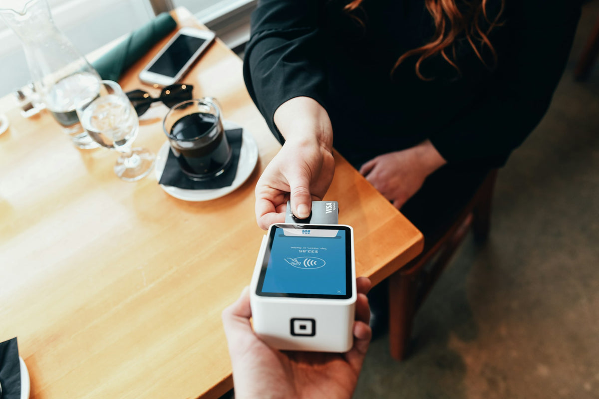Customer paying with a card terminal