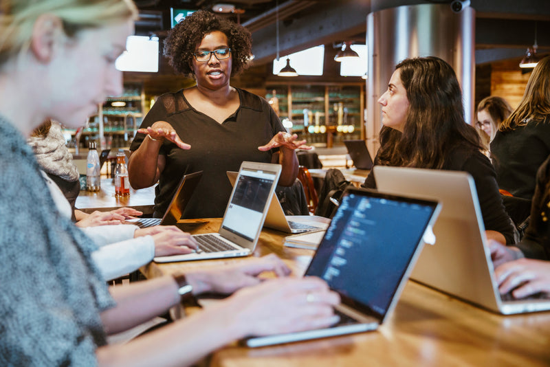 Woman giving instructions on a laptop